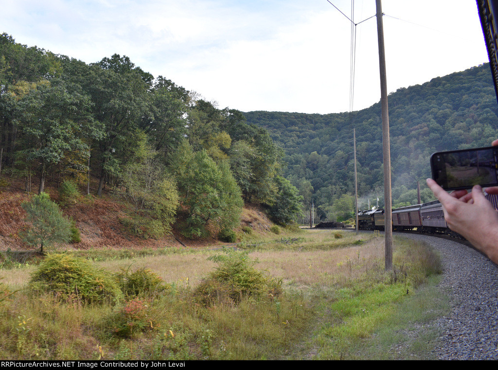 Looking out the window toward the front of our train as we round one of the S curves along the route